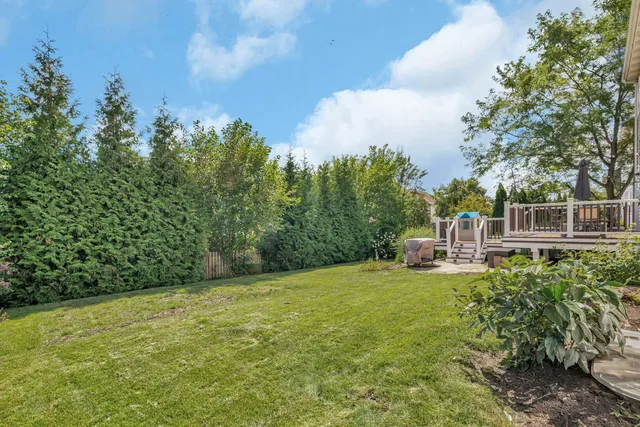 an aerial view of a house with a garden