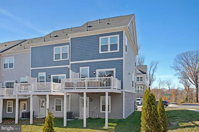 a front view of a building with garden