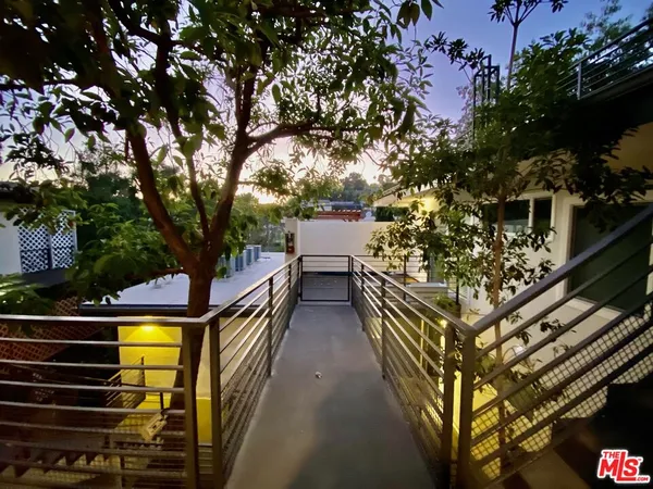 a view of swimming pool from a balcony