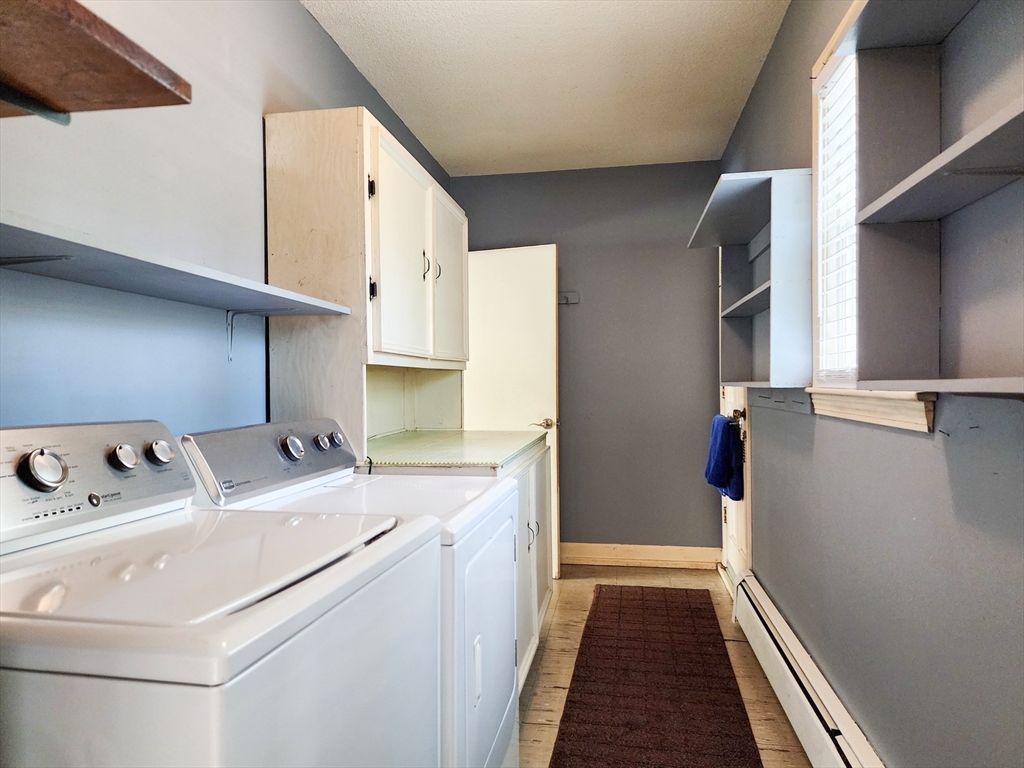 29 Sullivan Road Yarmouth, MA 02673 - Photo 12 of 42 a utility room with dryer and washer