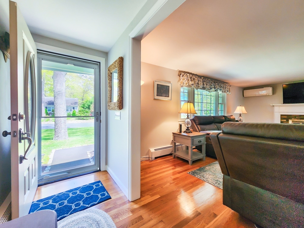 29 Sullivan Road Yarmouth, MA 02673 - Photo 3 of 42 a living room with furniture and a window