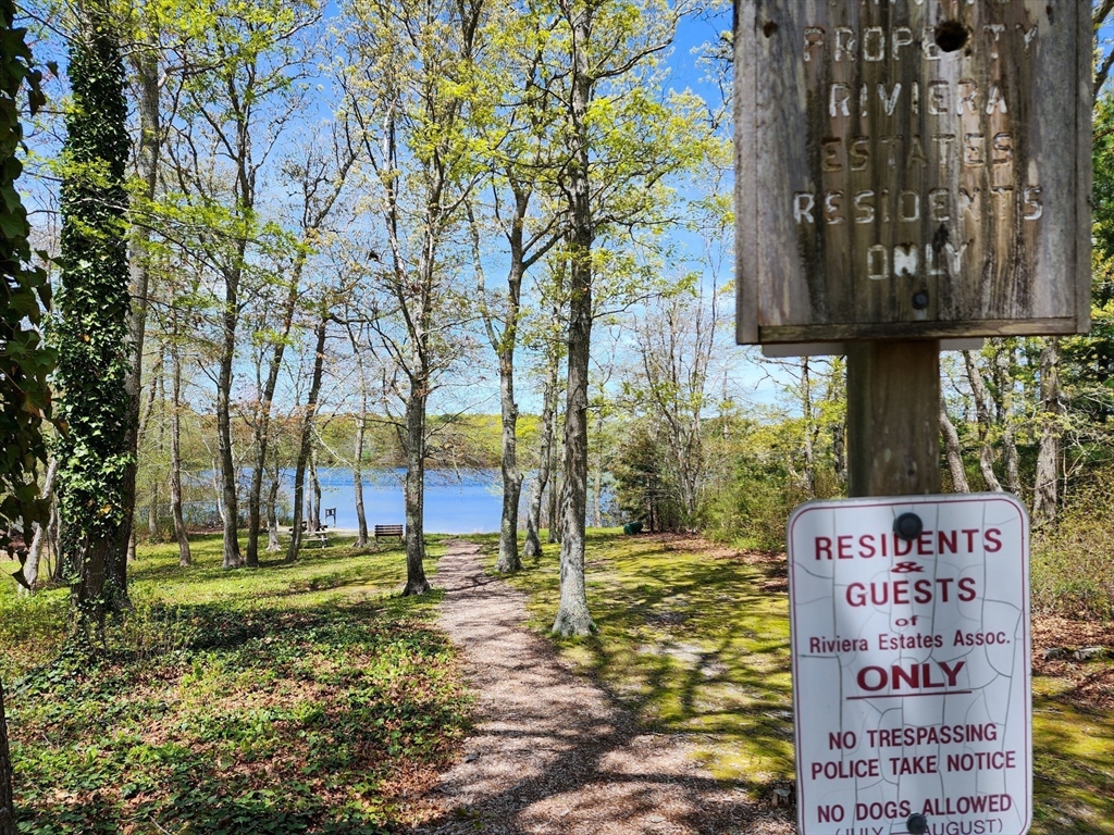 29 Sullivan Road Yarmouth, MA 02673 - Photo 37 of 42 a sign on the side of a road