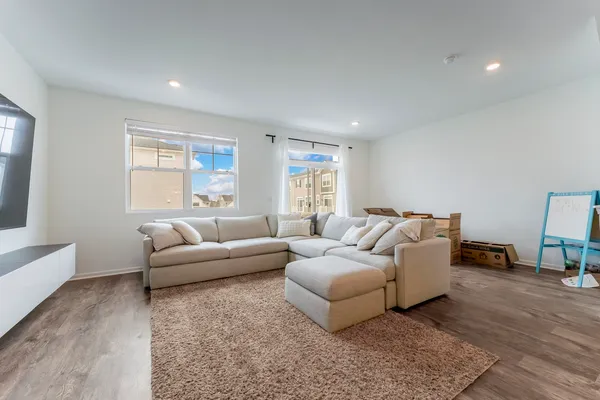 a living room with furniture and a couch