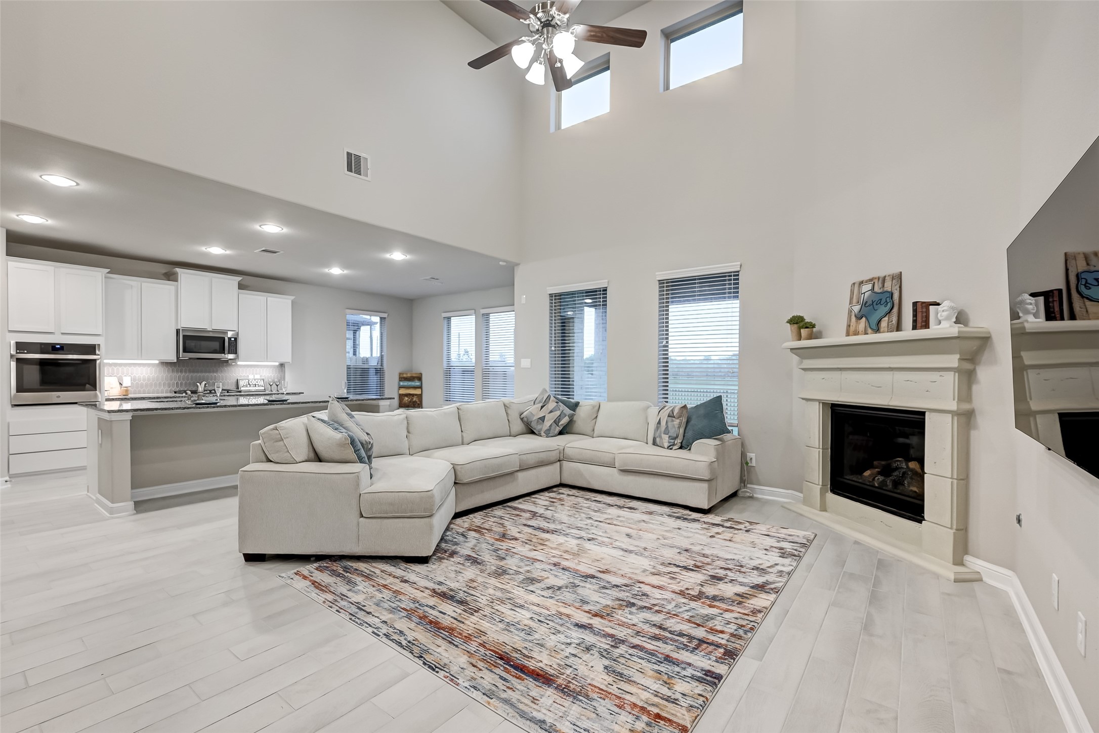 3327 Learning Tree Lane Rosenberg, TX 77471 - Photo 14 of 50 Family room features large windows for an abundance of natural light