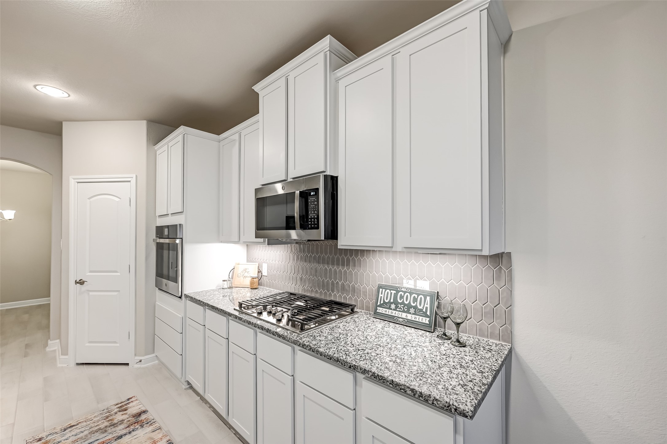 3327 Learning Tree Lane Rosenberg, TX 77471 - Photo 18 of 50 Kitchen features beautiful granite countertops with honeycomb backsplash