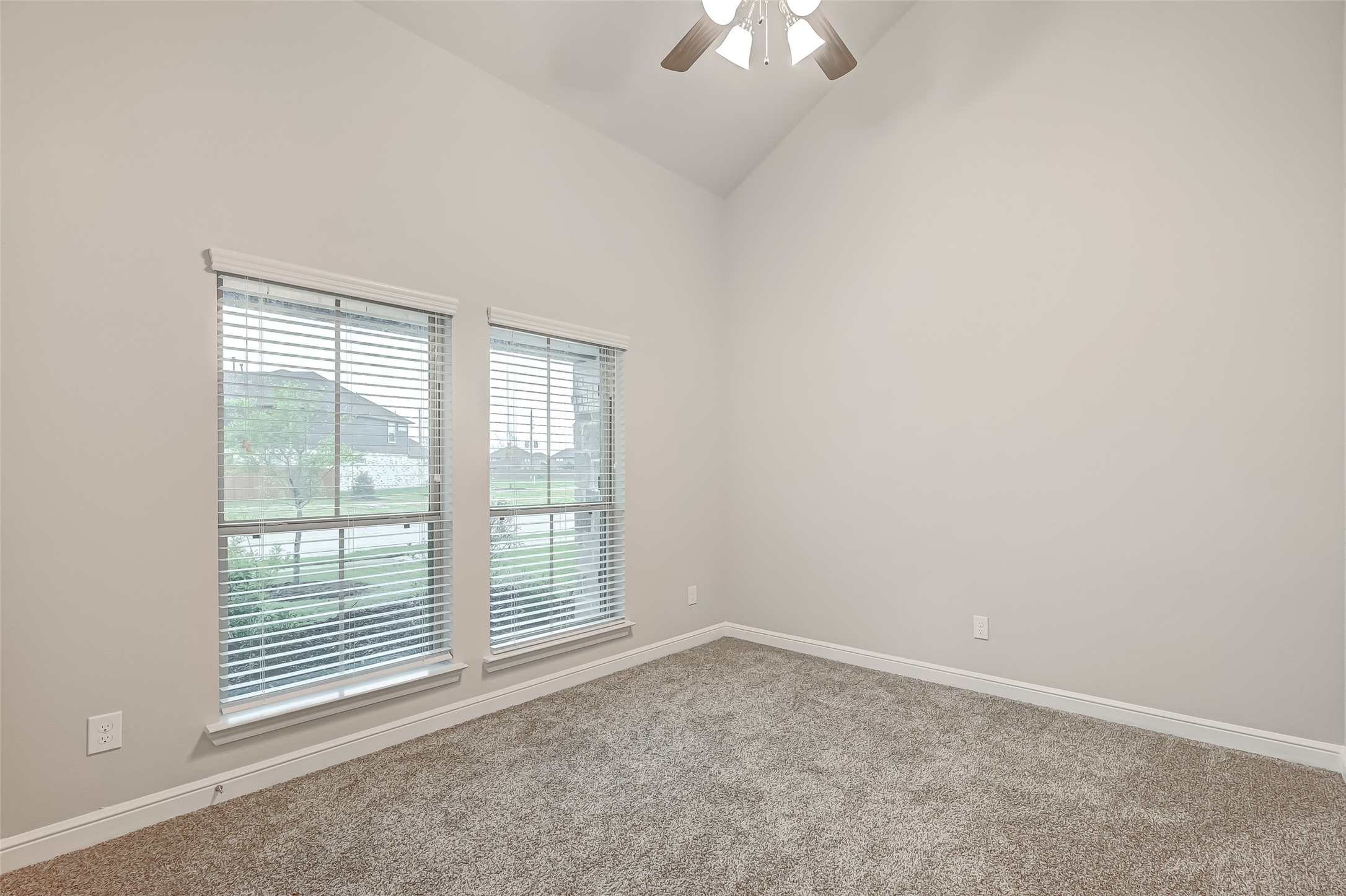 3327 Learning Tree Lane Rosenberg, TX 77471 - Photo 24 of 50 The front secondary bedroom offers flexibility as a sophisticated home office.