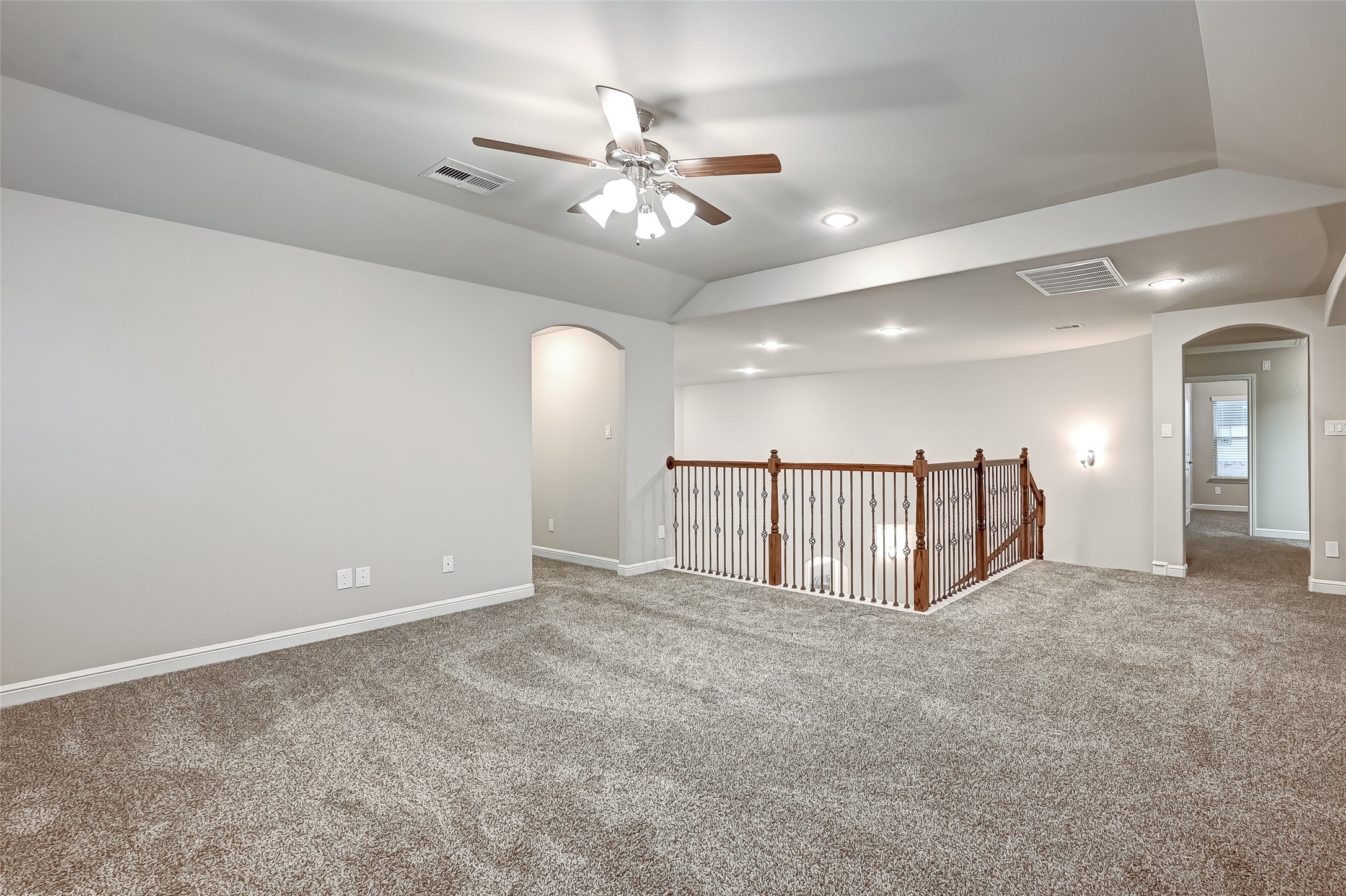 3327 Learning Tree Lane Rosenberg, TX 77471 - Photo 33 of 50 The upstairs features a generous game room with plush carpet, along with 4 spacious bedrooms, each offering a walk-in closet, and three beautifully appointed full bathrooms.