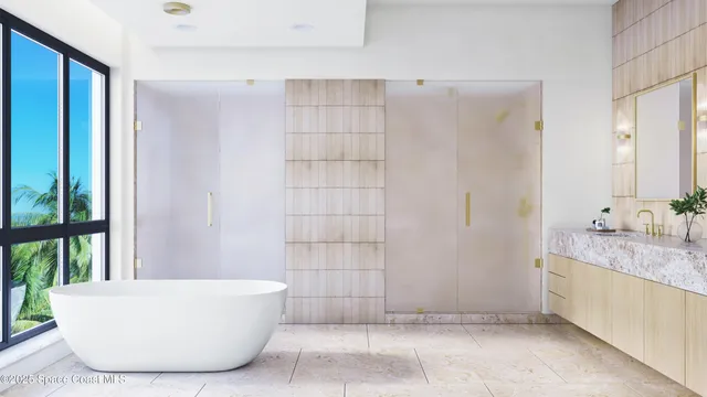 a bathroom with a bathtub and shower