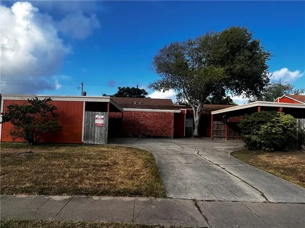 a view of a couches under a large yard