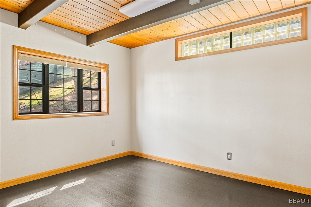 28971 Banff Drive Lake Arrowhead, CA 92352 - Photo 12 of 46 a view of an empty room with a window