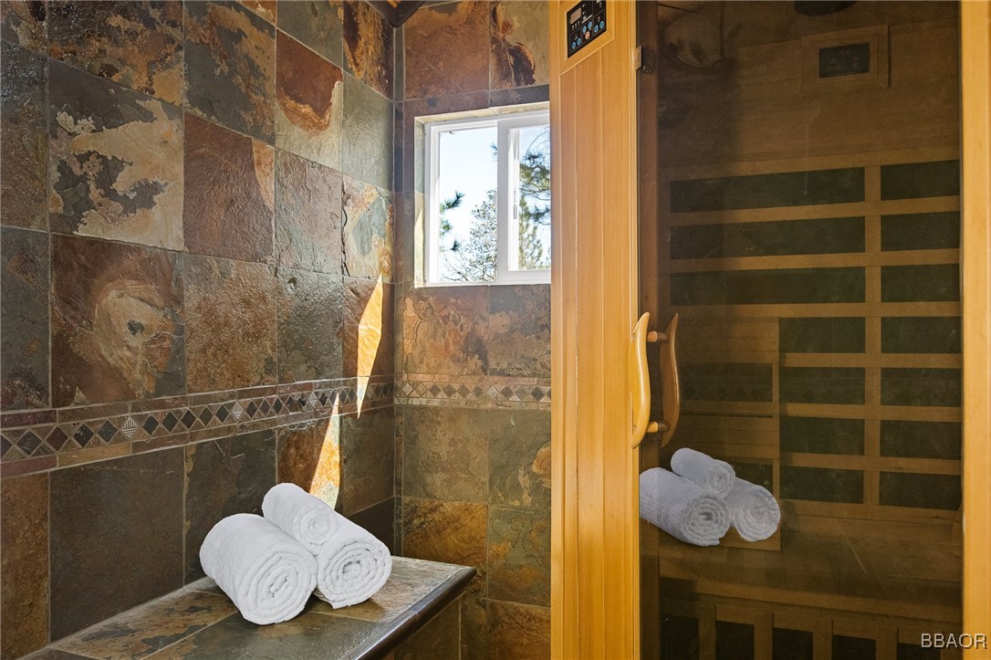 28971 Banff Drive Lake Arrowhead, CA 92352 - Photo 31 of 46 a bathroom with a toilet and a shower