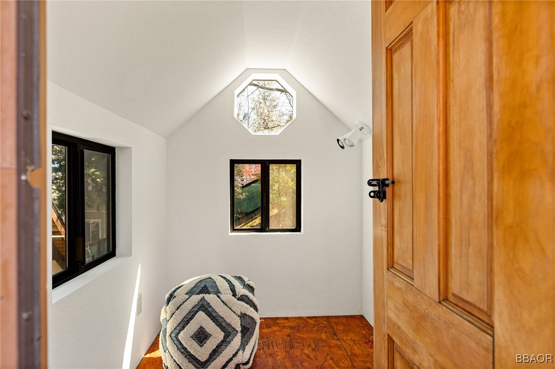 28971 Banff Drive Lake Arrowhead, CA 92352 - Photo 41 of 46 a view of front door with wooden floor