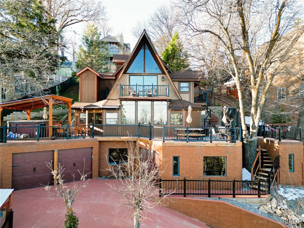 28971 Banff Drive Lake Arrowhead, CA 92352 - Photo 45 of 46 a view of a house with backyard and sitting area