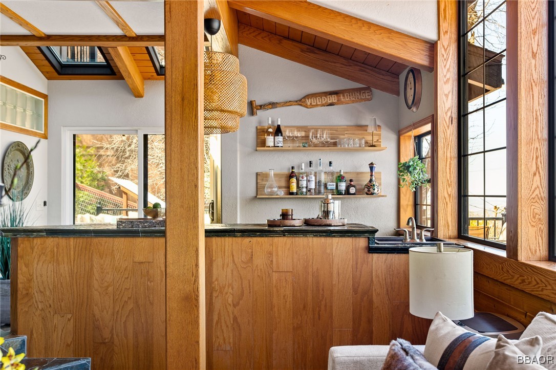 28971 Banff Drive Lake Arrowhead, CA 92352 - Photo 6 of 46 a view of a living room with a large window