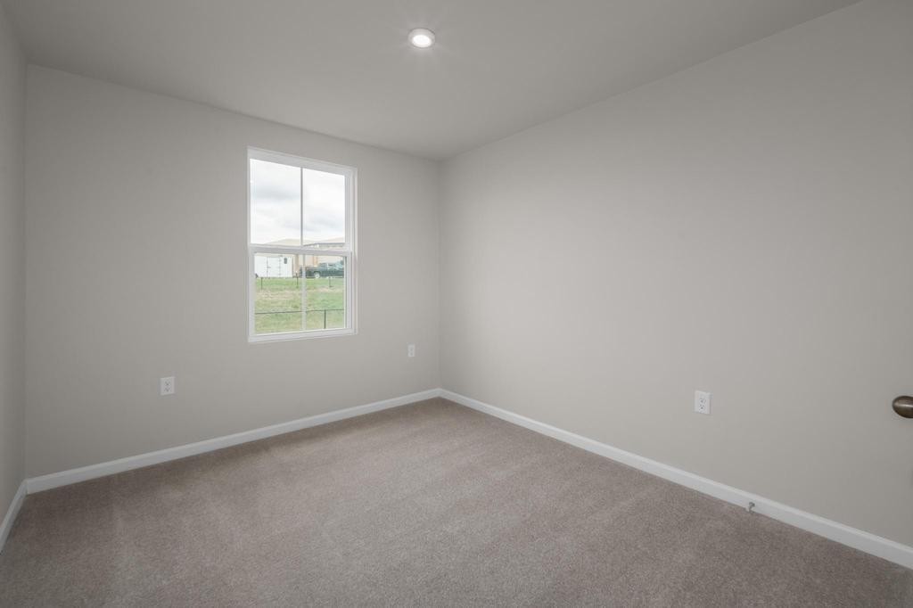 1110 Aubrey Meadows Place Franklin, KY 42134 - Photo 12 of 20 an empty room with a window