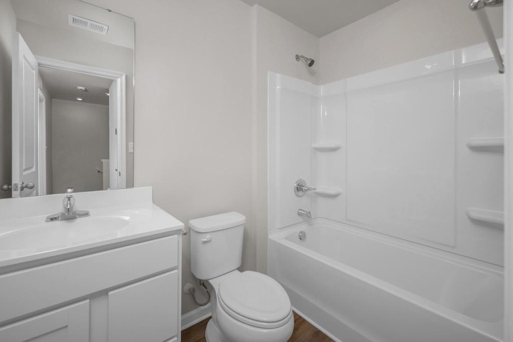 1110 Aubrey Meadows Place Franklin, KY 42134 - Photo 13 of 20 a bathroom with a sink toilet and bathtub