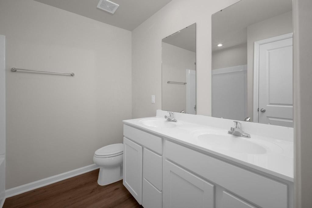 1110 Aubrey Meadows Place Franklin, KY 42134 - Photo 17 of 20 a bathroom with a sink a toilet and a mirror