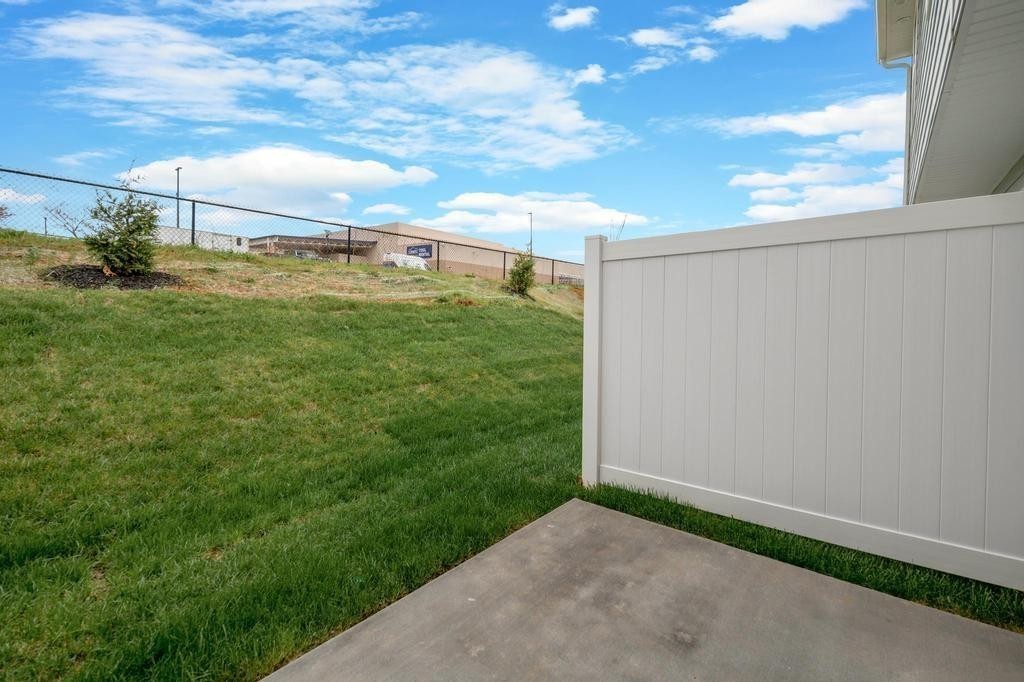 1110 Aubrey Meadows Place Franklin, KY 42134 - Photo 20 of 20 a view of a big yard with wooden fence