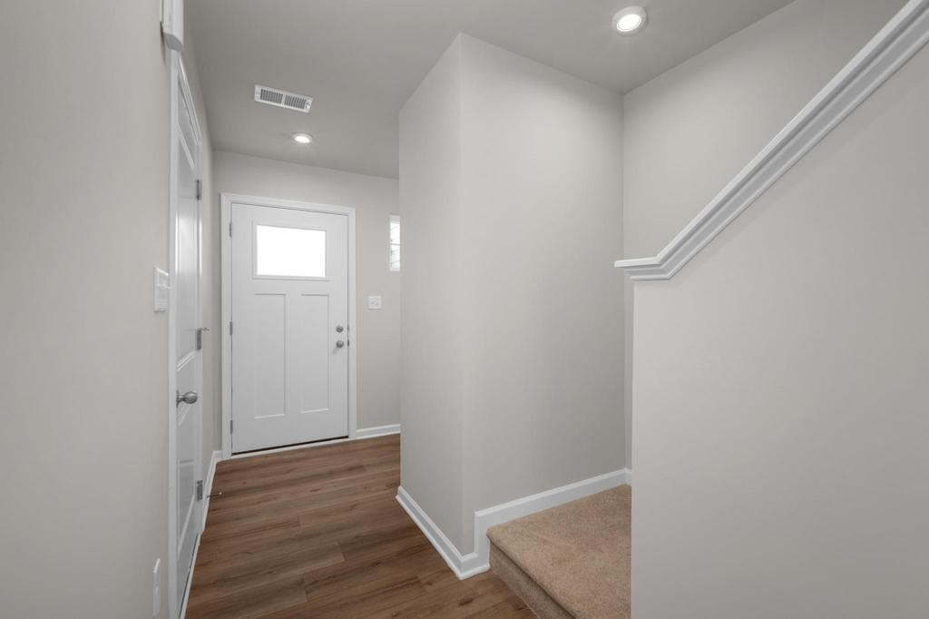 1110 Aubrey Meadows Place Franklin, KY 42134 - Photo 3 of 20 a view of an empty room with wooden floor