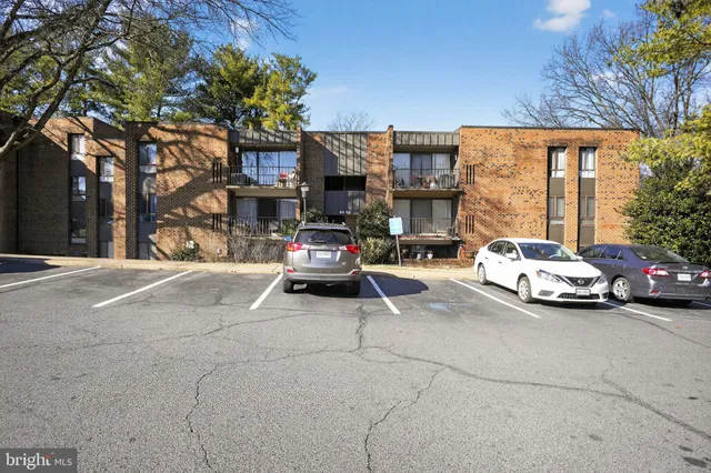 a car parked in front of a building