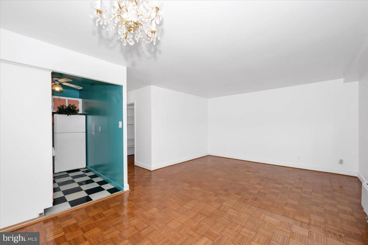 9701 Fields Road, Unit 2206 Gaithersburg, MD 20878 - Photo 12 of 30 wooden floor in an empty room