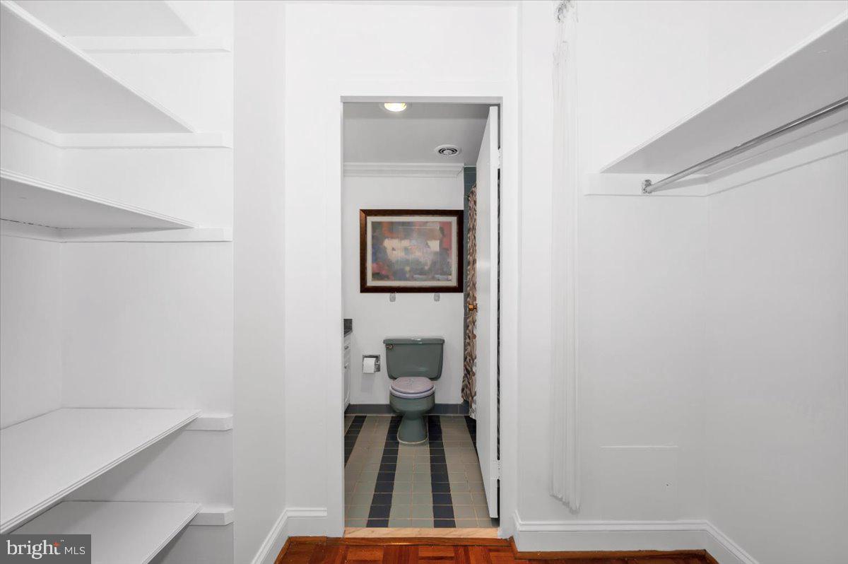 9701 Fields Road, Unit 2206 Gaithersburg, MD 20878 - Photo 16 of 30 a bathroom with a toilet