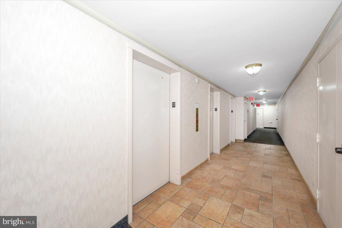 9701 Fields Road, Unit 2206 Gaithersburg, MD 20878 - Photo 5 of 30 a view of a hallway