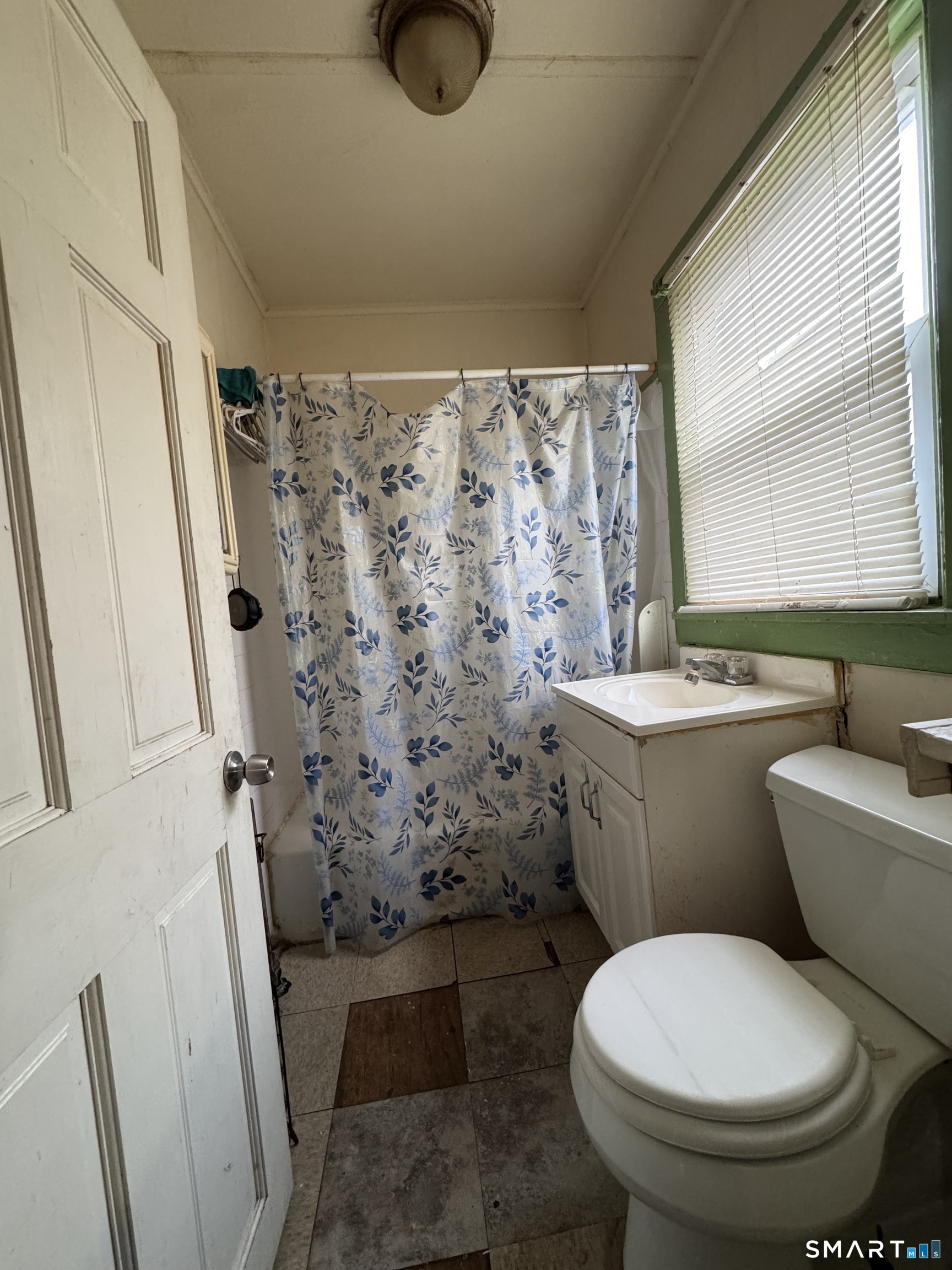 6 Williams Street New London, CT 06320 - Photo 12 of 23 a bathroom with a toilet and a shower