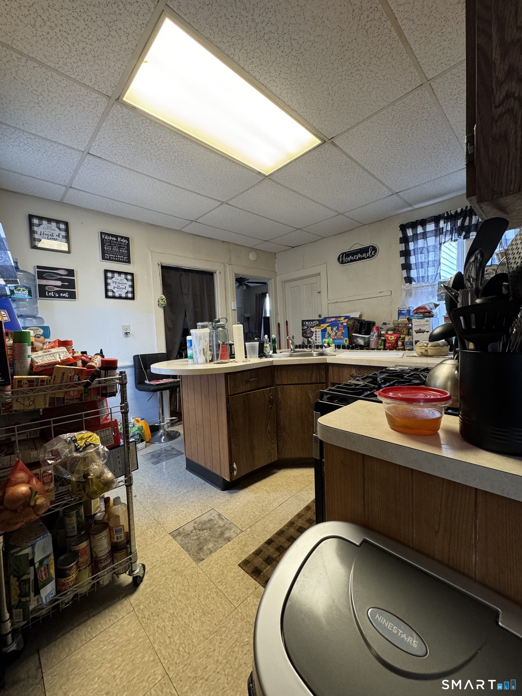 6 Williams Street New London, CT 06320 - Photo 18 of 23 a living room with furniture and a mirror