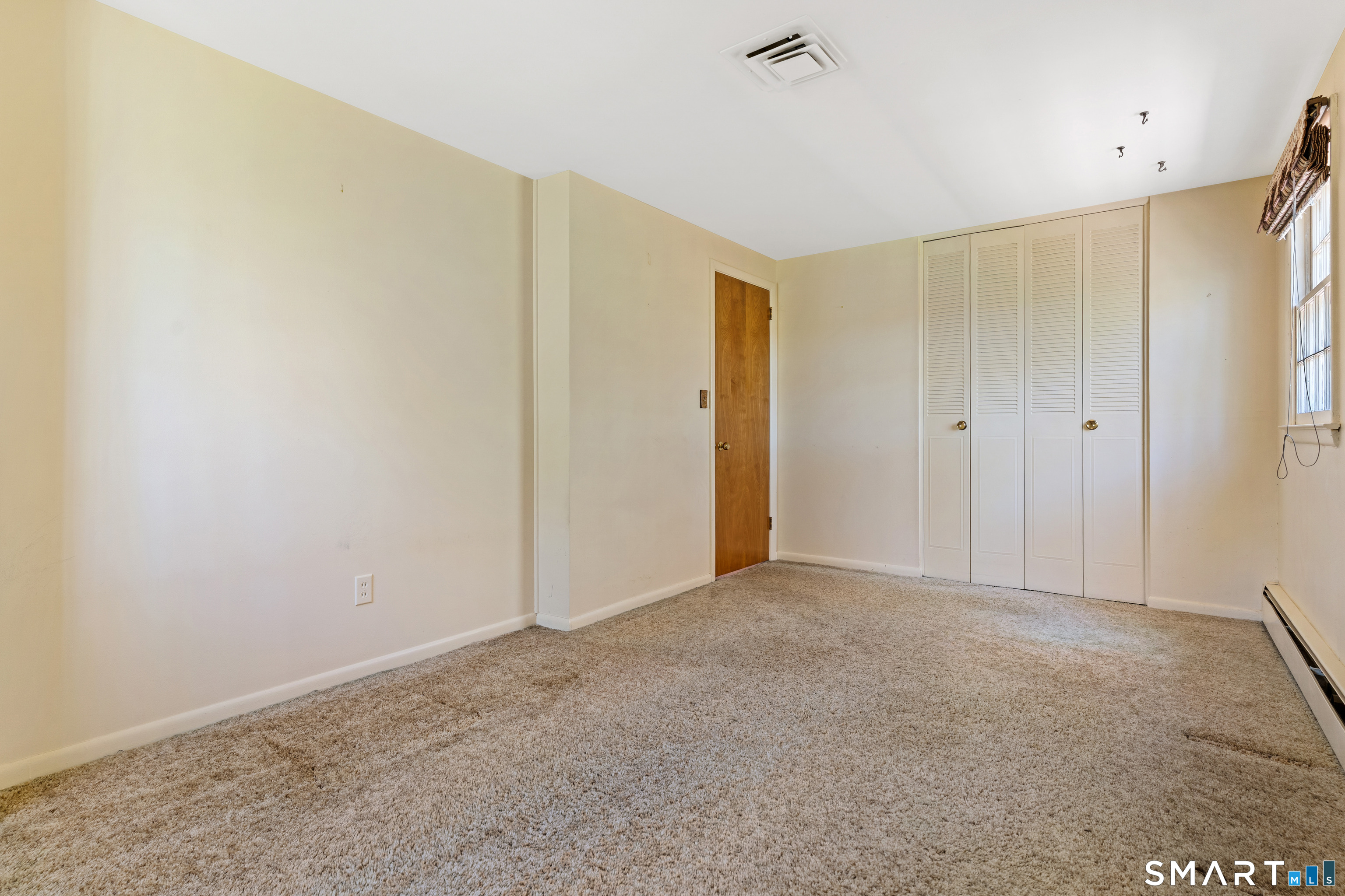 251 Shelter Rock Road Fairfield, CT 06825 - Photo 21 of 38 a view of an empty room