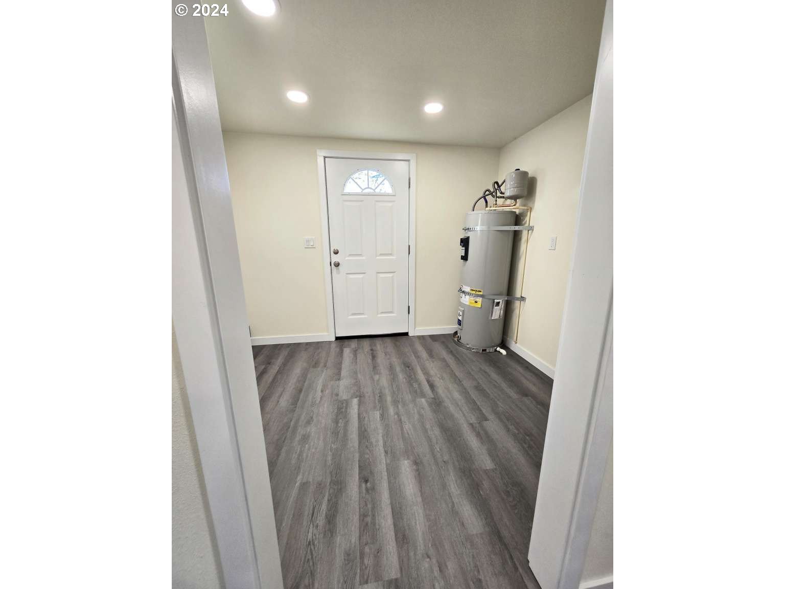 1223 C Street Springfield, OR 97477 - Photo 8 of 36 a view of empty room with wooden floor