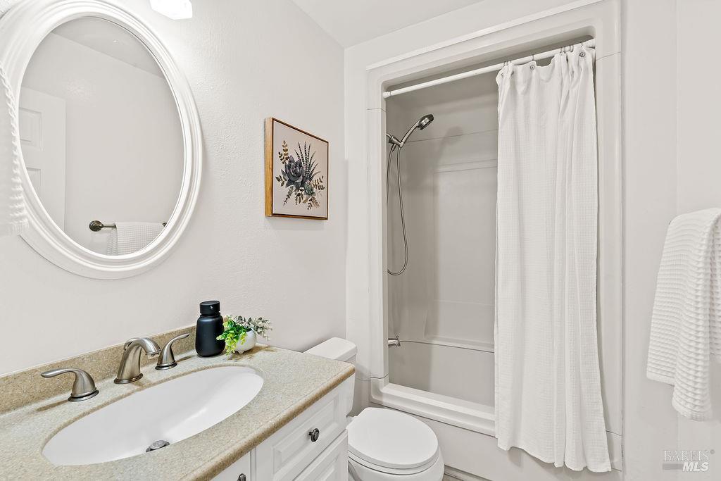 5171 Firestone Place Santa Rosa, CA 95409 - Photo 29 of 48 The upstairs full bathroom is conveniently situated next to the two secondary bedrooms.