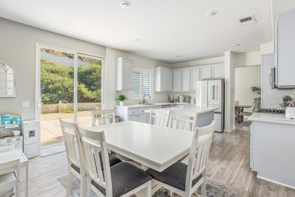 16478 Spirit Road Moreno Valley, CA 92555 - Photo 16 of 32 a view of a dining room with furniture window and outside view