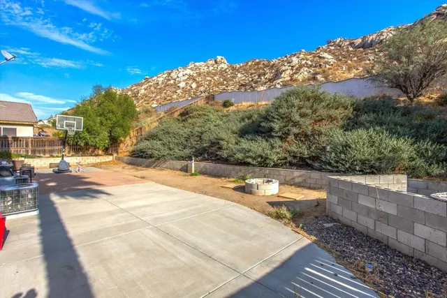 a view of swimming pool with a yard