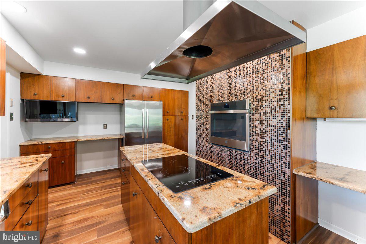 962 Frazier Road Rydal, PA 19046 - Photo 22 of 50 a kitchen that has a sink and a stove in it