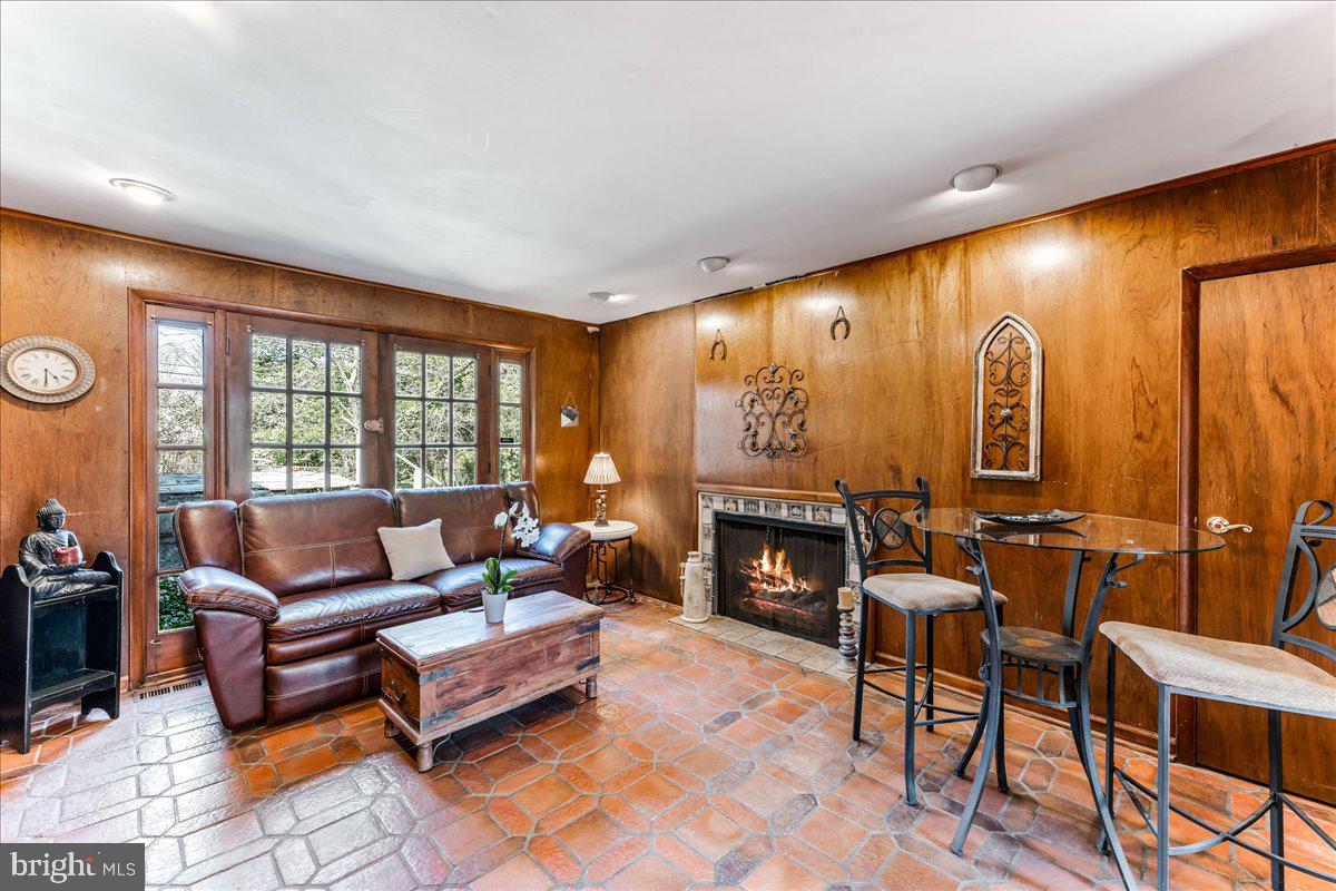 962 Frazier Road Rydal, PA 19046 - Photo 26 of 50 a living room with furniture and a fireplace