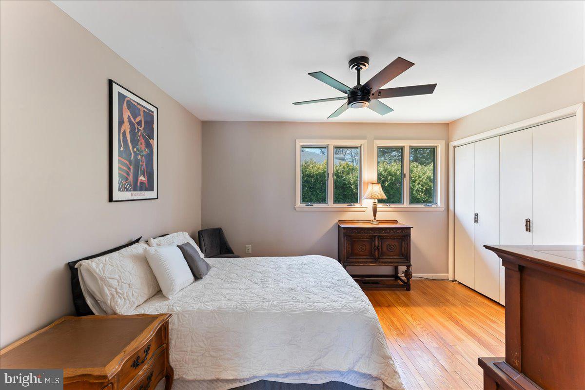 962 Frazier Road Rydal, PA 19046 - Photo 38 of 50 a bedroom with a bed and wooden floor