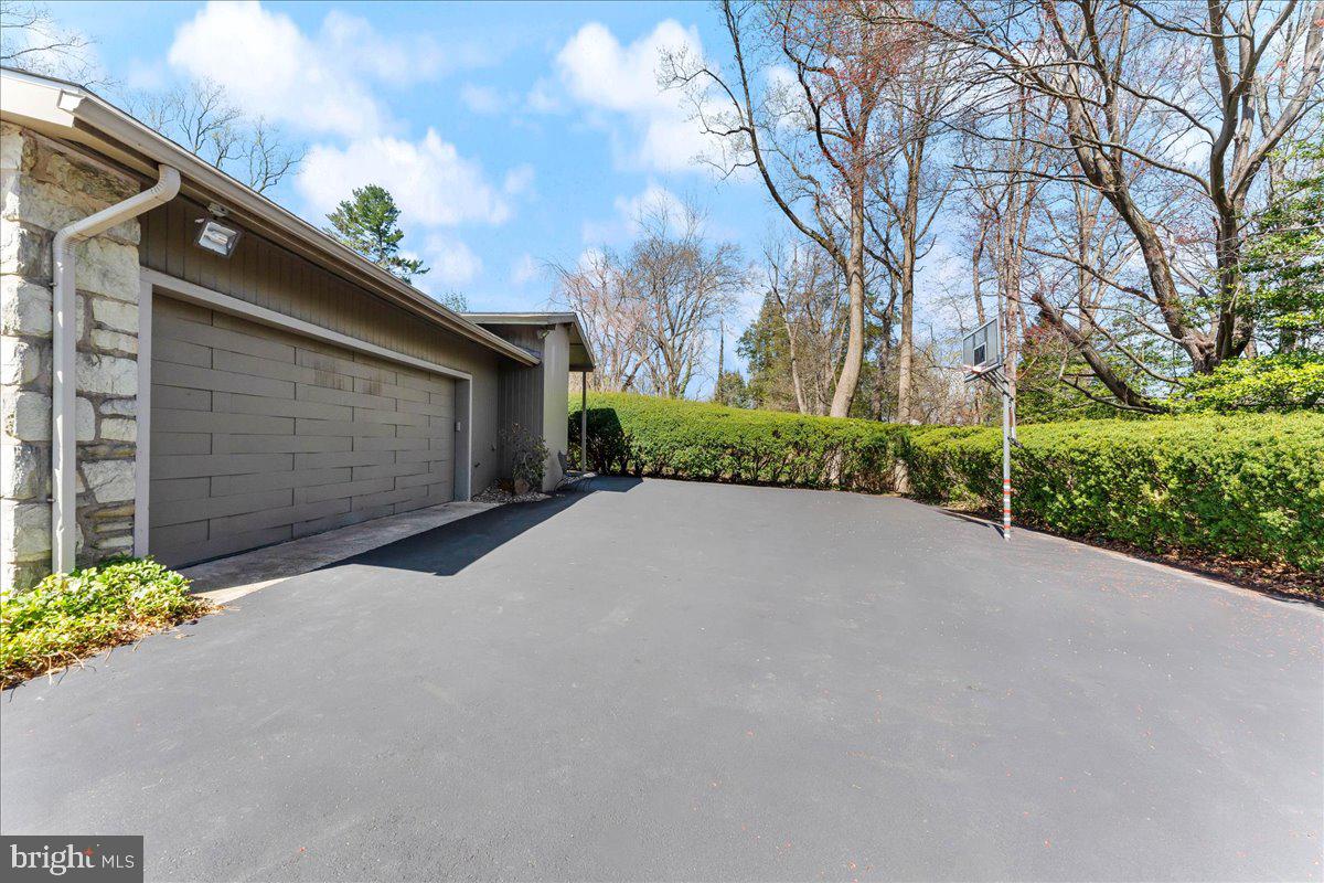 962 Frazier Road Rydal, PA 19046 - Photo 46 of 50 a view of a garage with a street