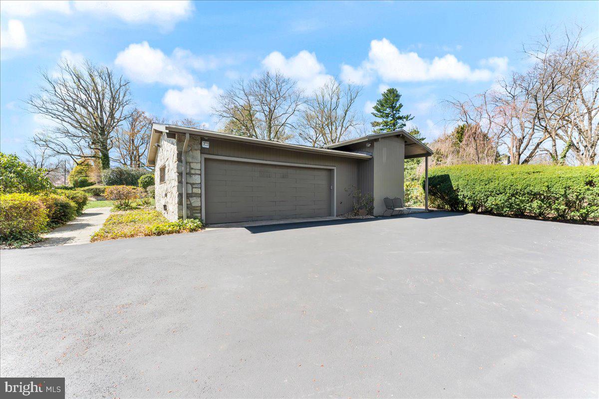 962 Frazier Road Rydal, PA 19046 - Photo 47 of 50 a view of a house with a yard and garage
