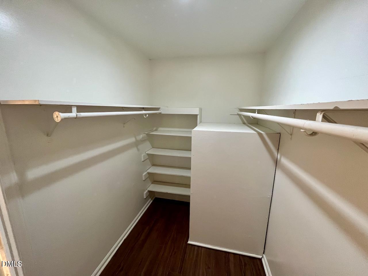 4205 Greencastle Court, Unit D Raleigh, NC 27604 - Photo 9 of 13 a view of storage and utility room with wooden floor