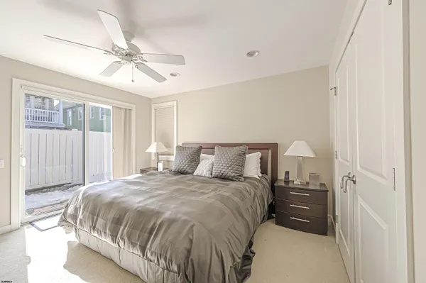 a view of a hallway with elevator and entrance