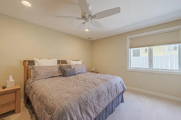 a view of a balcony with two chairs and a table