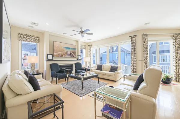 a view of a livingroom with furniture and window