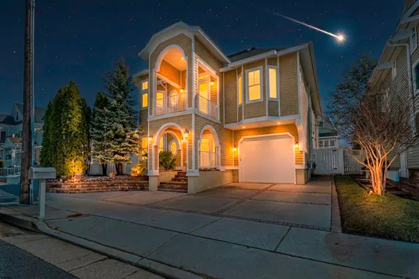 a view of building with tree s