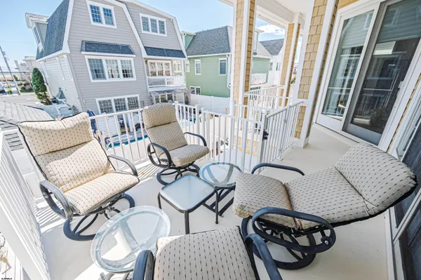 a kitchen with a refrigerator and a sink