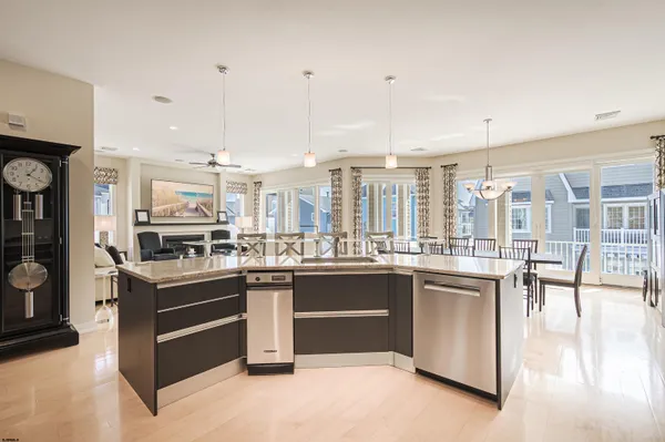 a bathroom with a granite countertop sink mirror toilet and shower