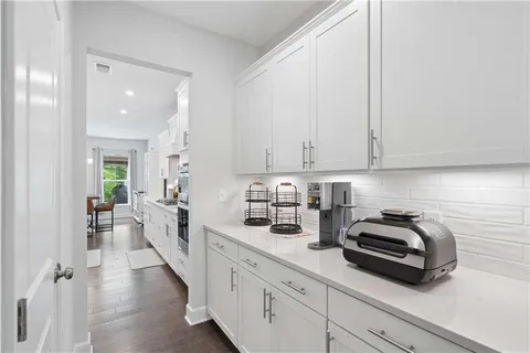 a kitchen with sink cabinets and window