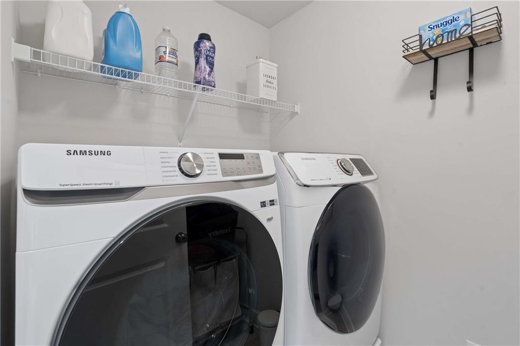 6168 Collins Road Acworth, GA 30101 - Photo 21 of 41 a utility room with dryer and washer
