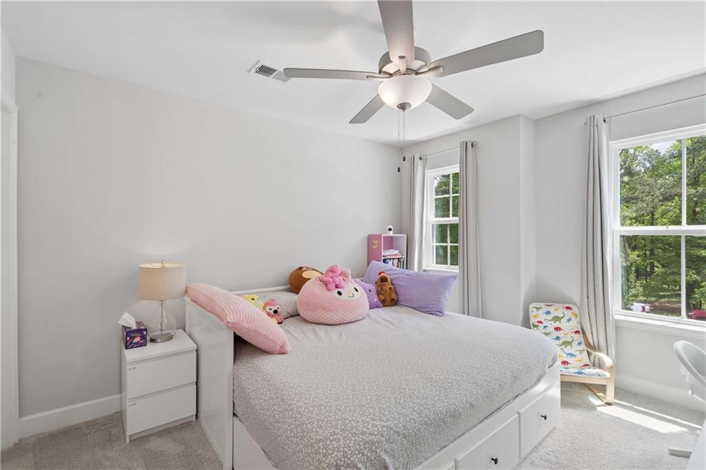 6168 Collins Road Acworth, GA 30101 - Photo 26 of 41 a bedroom with a bed and window