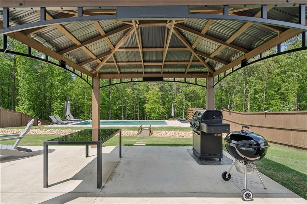 6168 Collins Road Acworth, GA 30101 - Photo 34 of 41 a view of a chairs and table in the patio